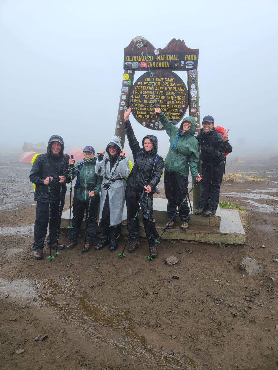 The trekking team in the rain at Shira Cave Camp